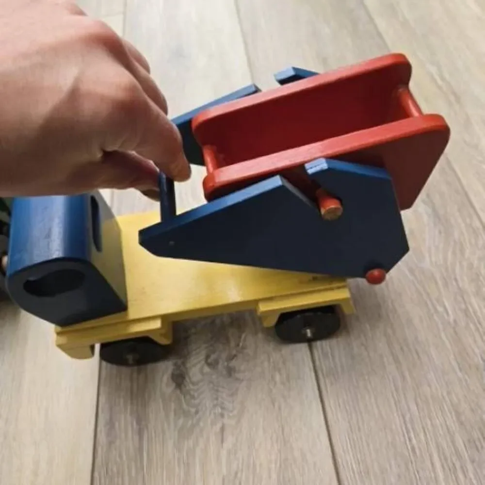 2 vintage Romania toy wooden trucks colorful, moving parts collectible